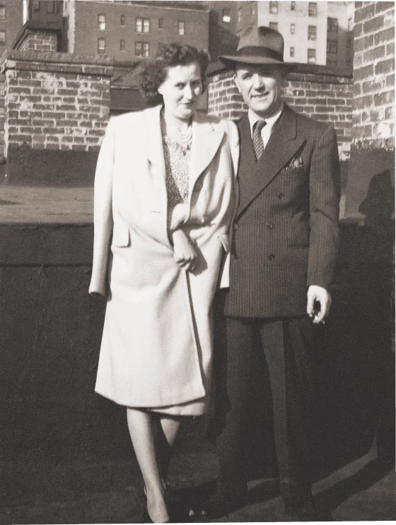 A man and woman standing next to each other.